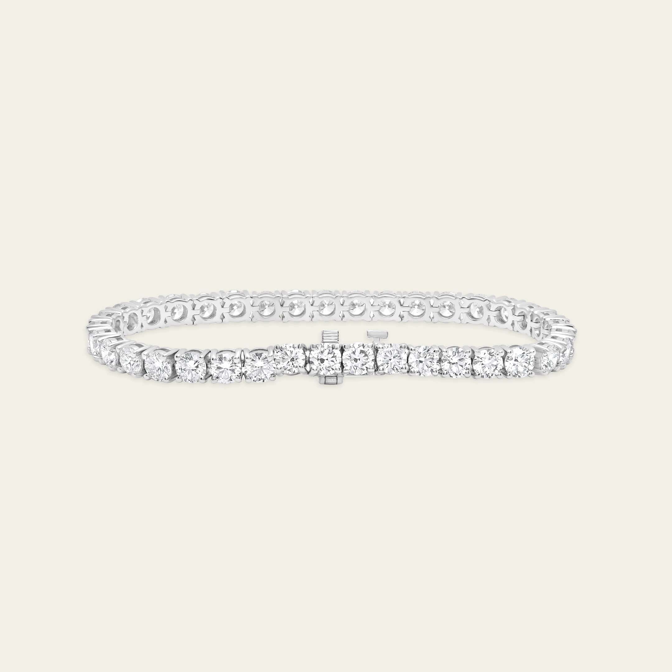 aurora-12-carat-round-diamond-tennis-bracelet-jewels-aficionado-1146590386.jpg
