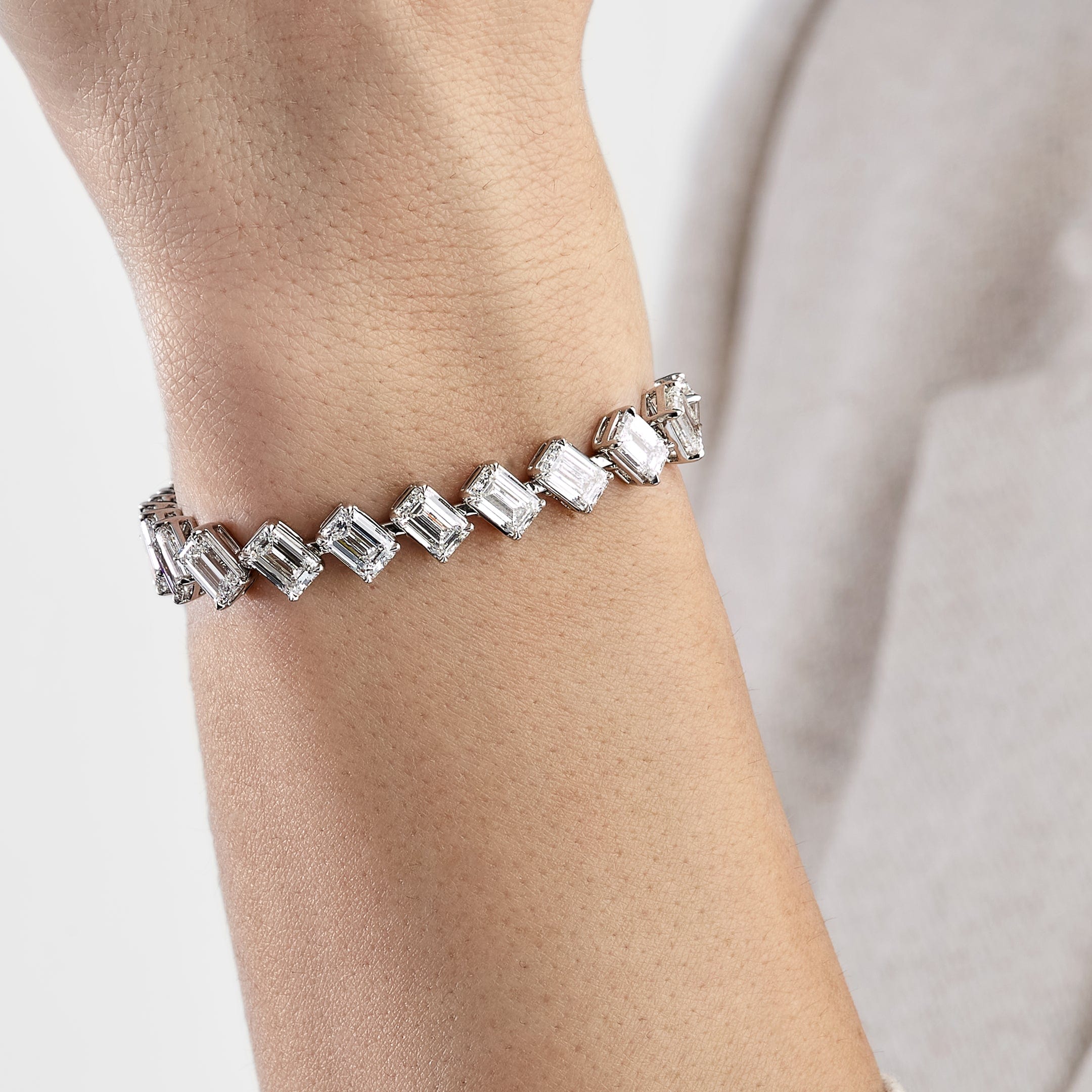 ella-angled-set-24-carat-diamond-tennis-bracelet-jewels-aficionado-1146587231.jpg