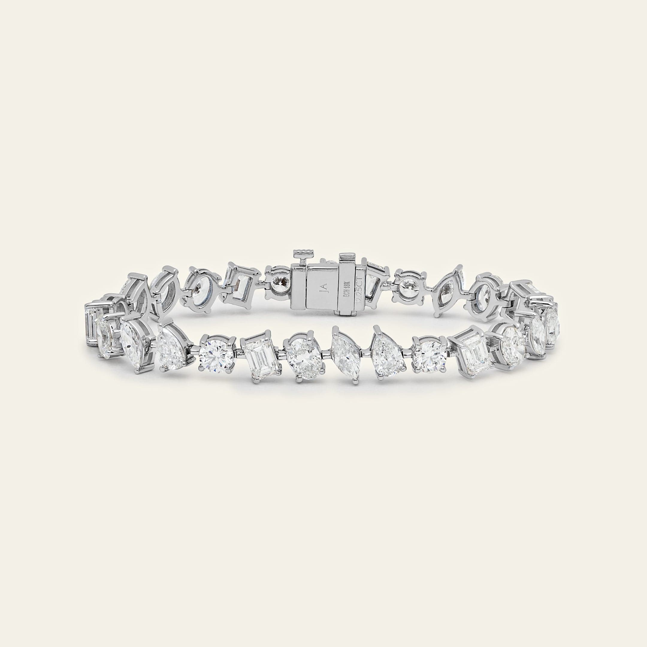 multi-shaped-diamond-bracelet-jewels-aficionado-1146589324.jpg