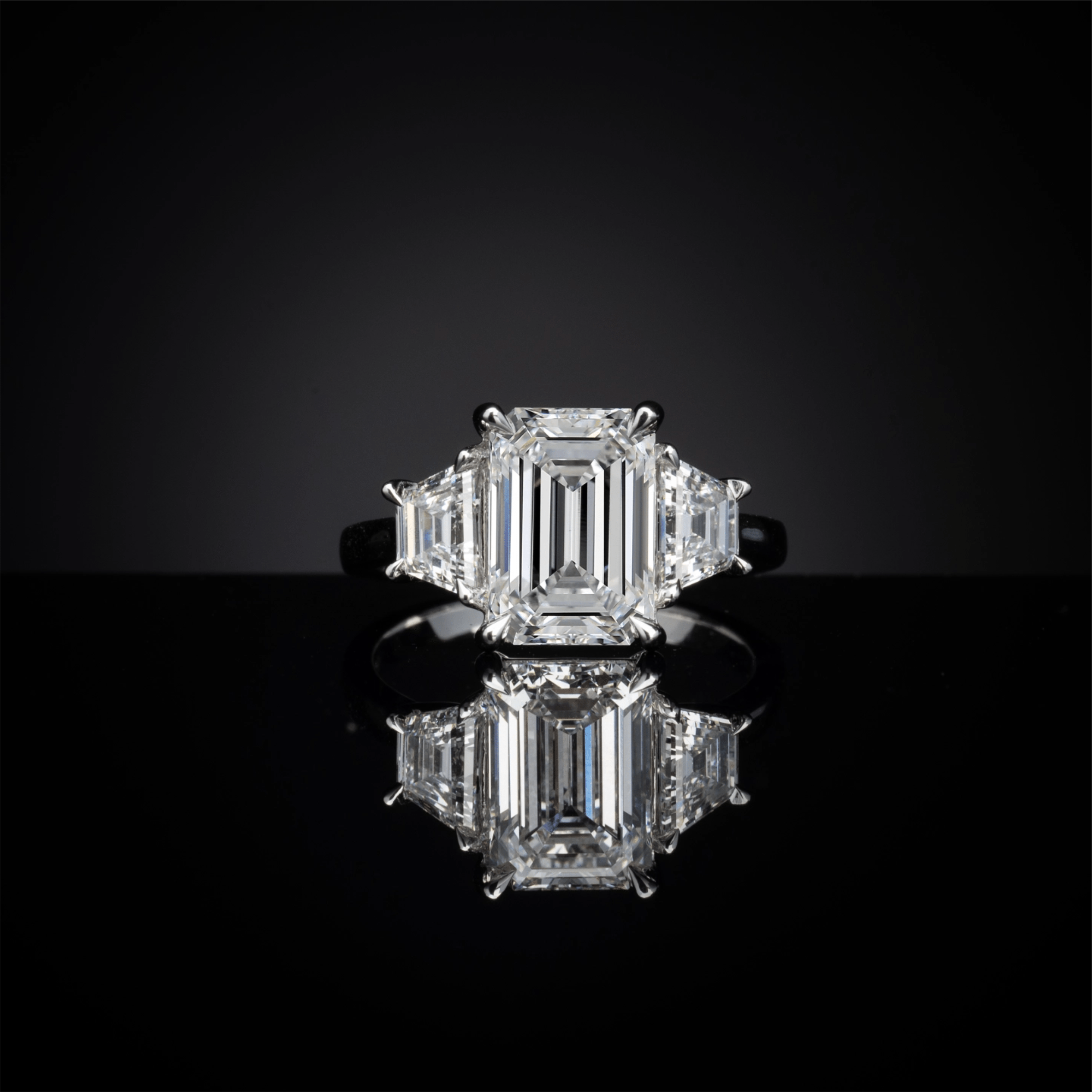 6-88-carat-emerald-lab-grown-diamond-three-stone-ring-jewels-aficionado-lab-1146587614.png