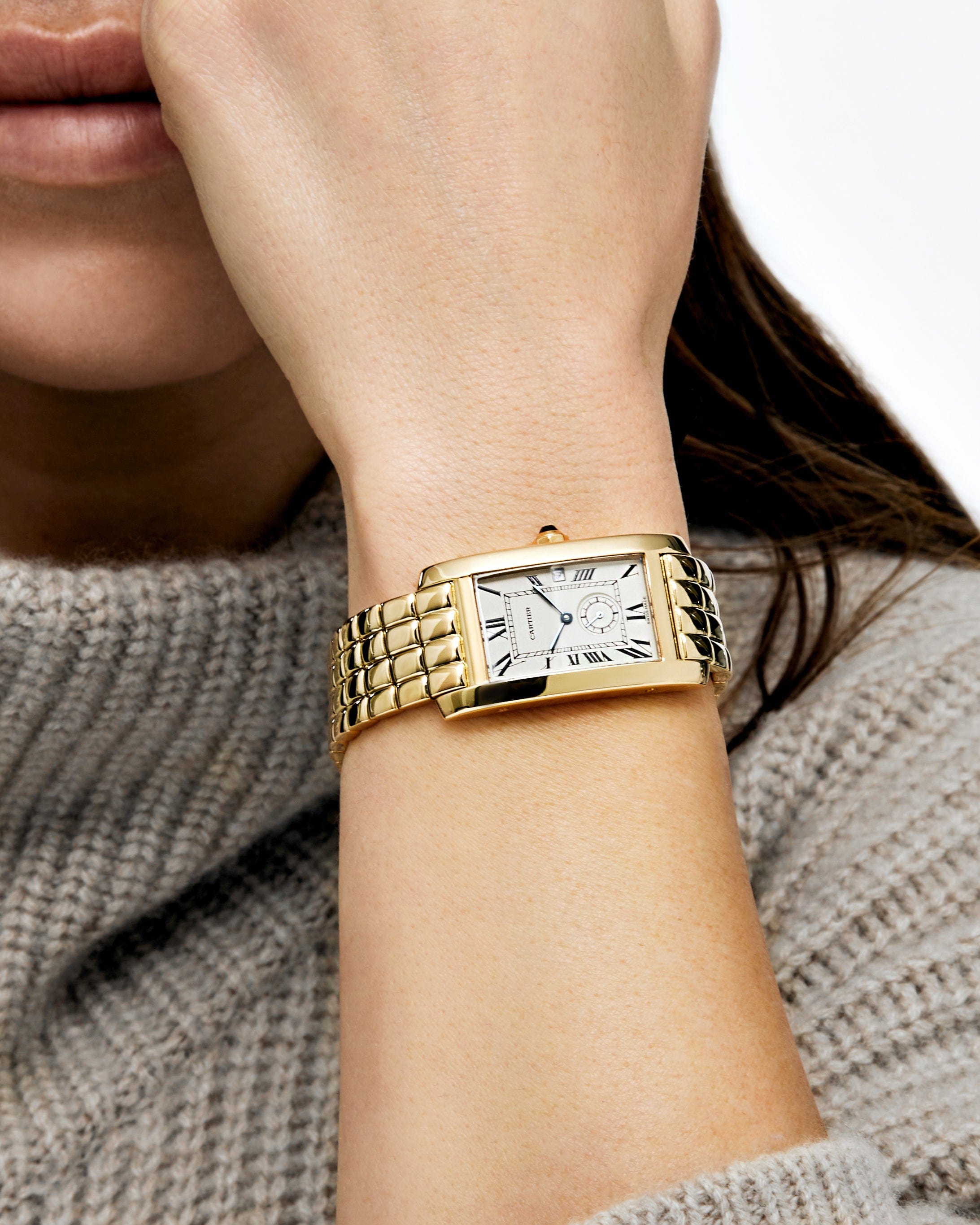 Cartier_Tank_W26001C9__YG_on_model_b25a2fff-94c7-4da8-9203-b1017ad9d690.jpg