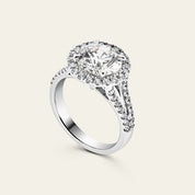 Custom Round Brilliant Cut Pave Halo Platinum Engagement Ring