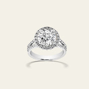 Custom Round Brilliant Cut Pave Halo Platinum Engagement Ring