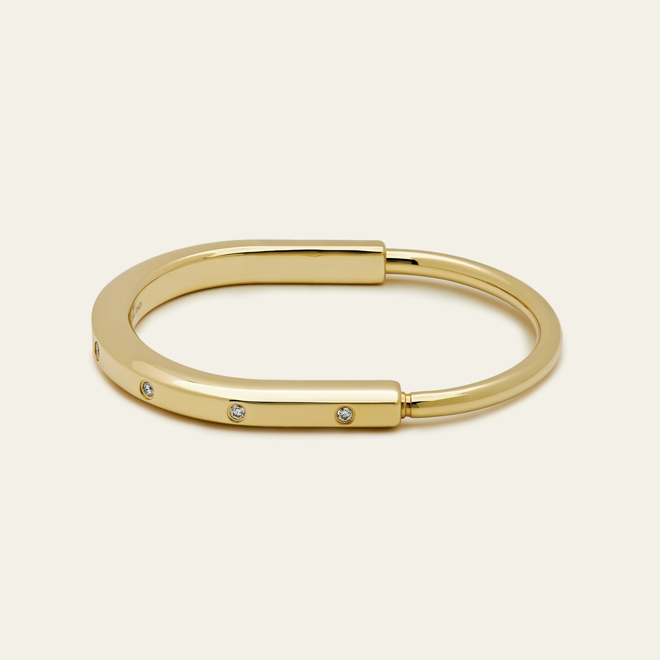 Tiffany & Co. Lock Bangle in Yellow Gold with Diamond Accents 70185407