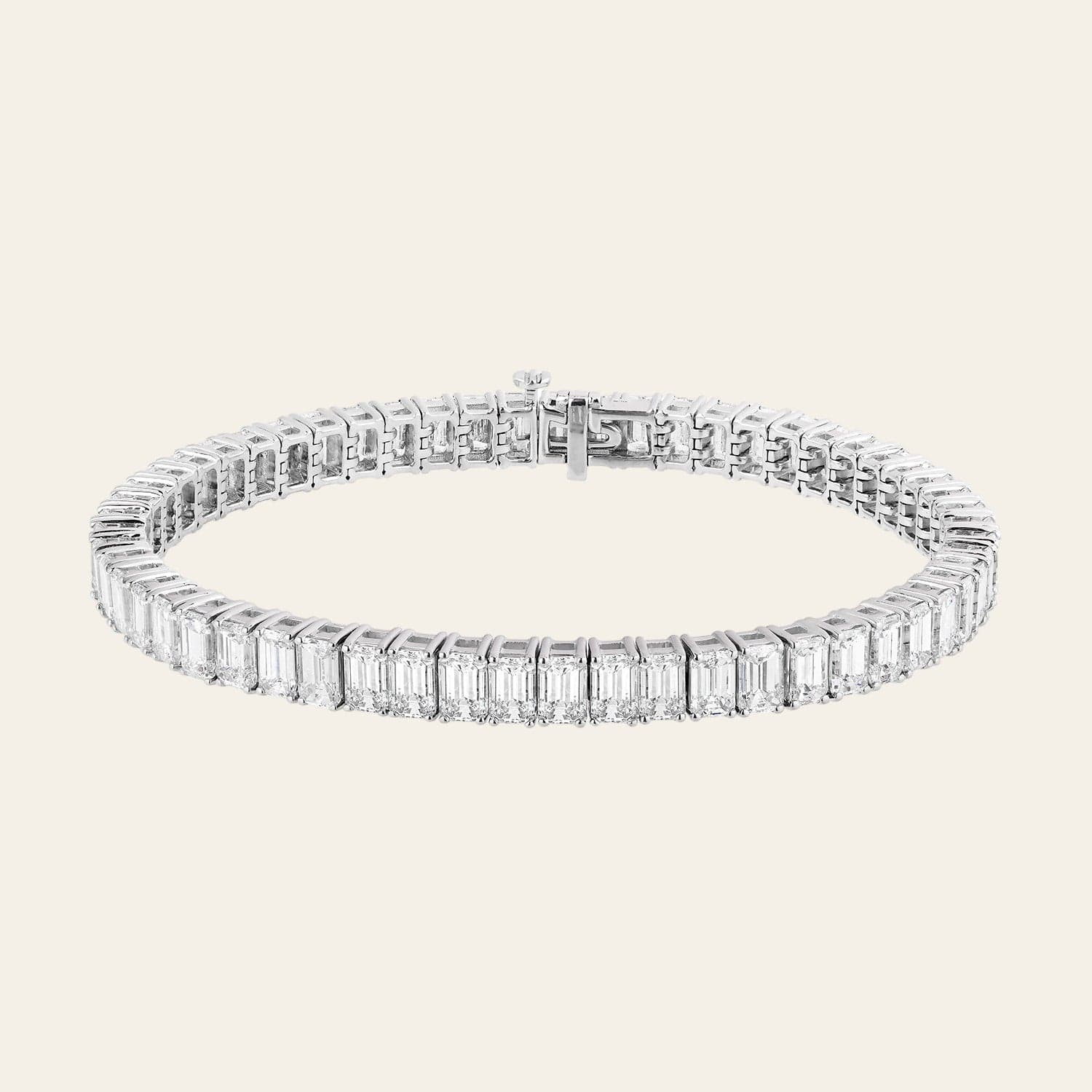 alya-18-carat-emerald-cut-diamond-tennis-bracelet-jewels-aficionado-1146587836.jpg