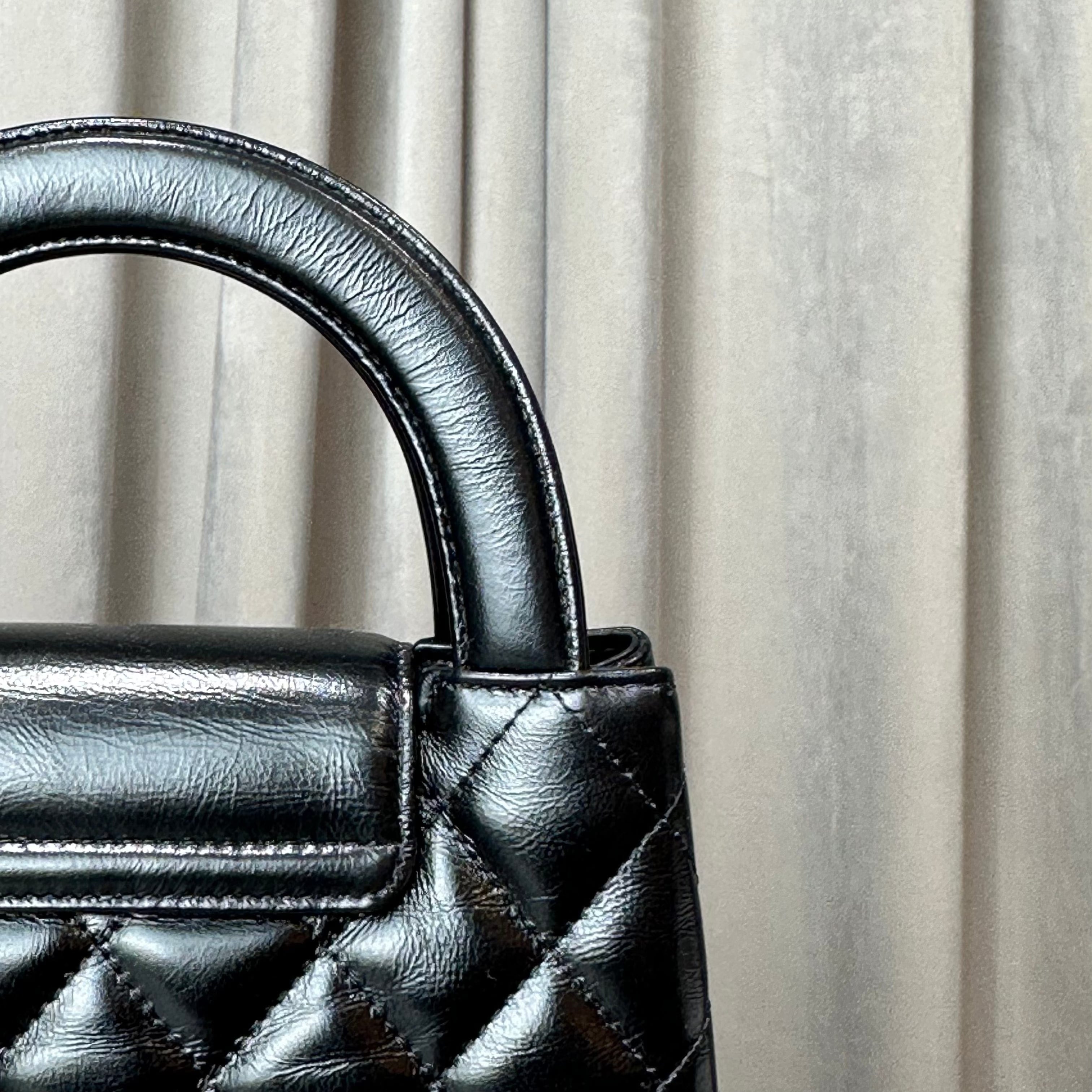 Chanel Nano Kelly Shopper Black Shiny Aged Quilted Calfskin Brushed Gold Hardware