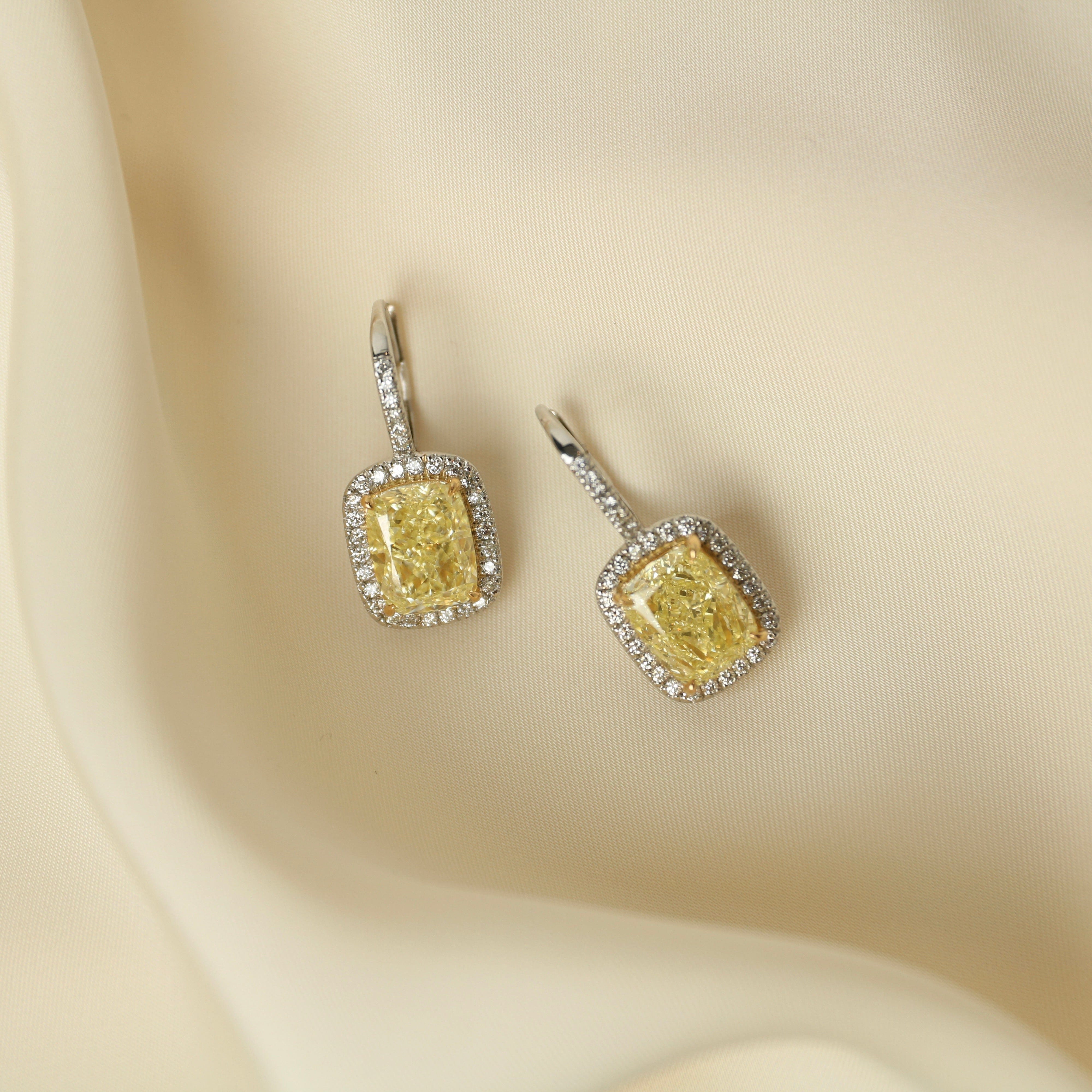 cushion-cut-fancy-yellow-diamond-earrings-with-pave-halo-jewels-aficionado-1180817894.jpg