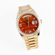 Rolex Day-Date 36 128398TBR Yellow Gold Carnelian Diamond Dial Diamond Bezel President (2025)