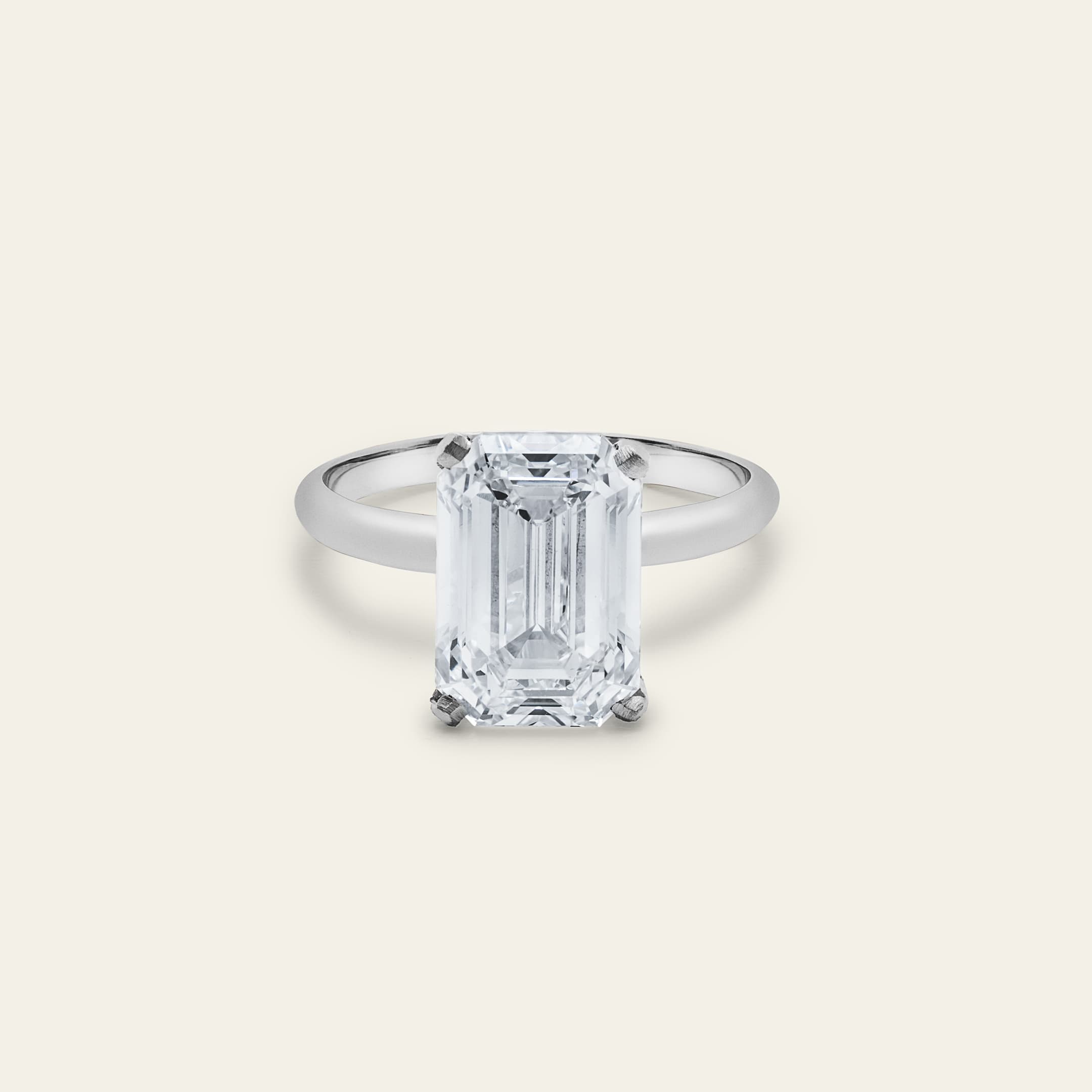 emerald-cut-diamond-engagement-ring-jewels-aficionado-1230475384.jpg