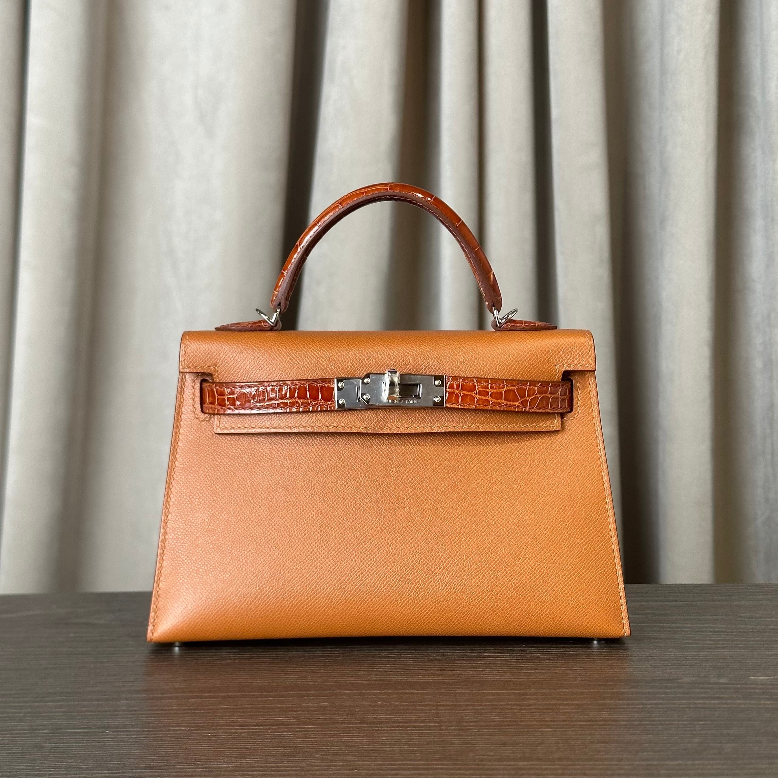hermes-aq-gold-and-etrusque-mini-kelly-20-madame-touch-alligator-mississippi-palladium-hardware-hermes-1186631218.jpg