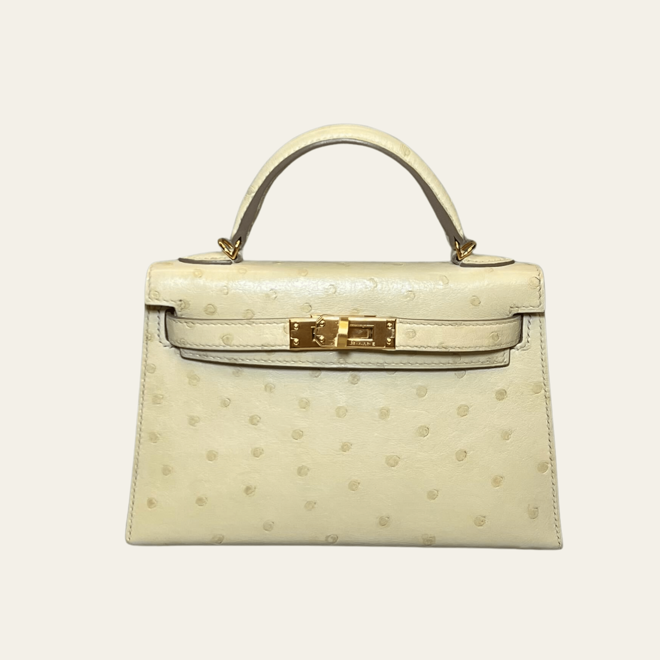 hermes-beton-craie-mini-kelly-sellier-20-ostrich-gold-hardware-hermes-1197114295.png