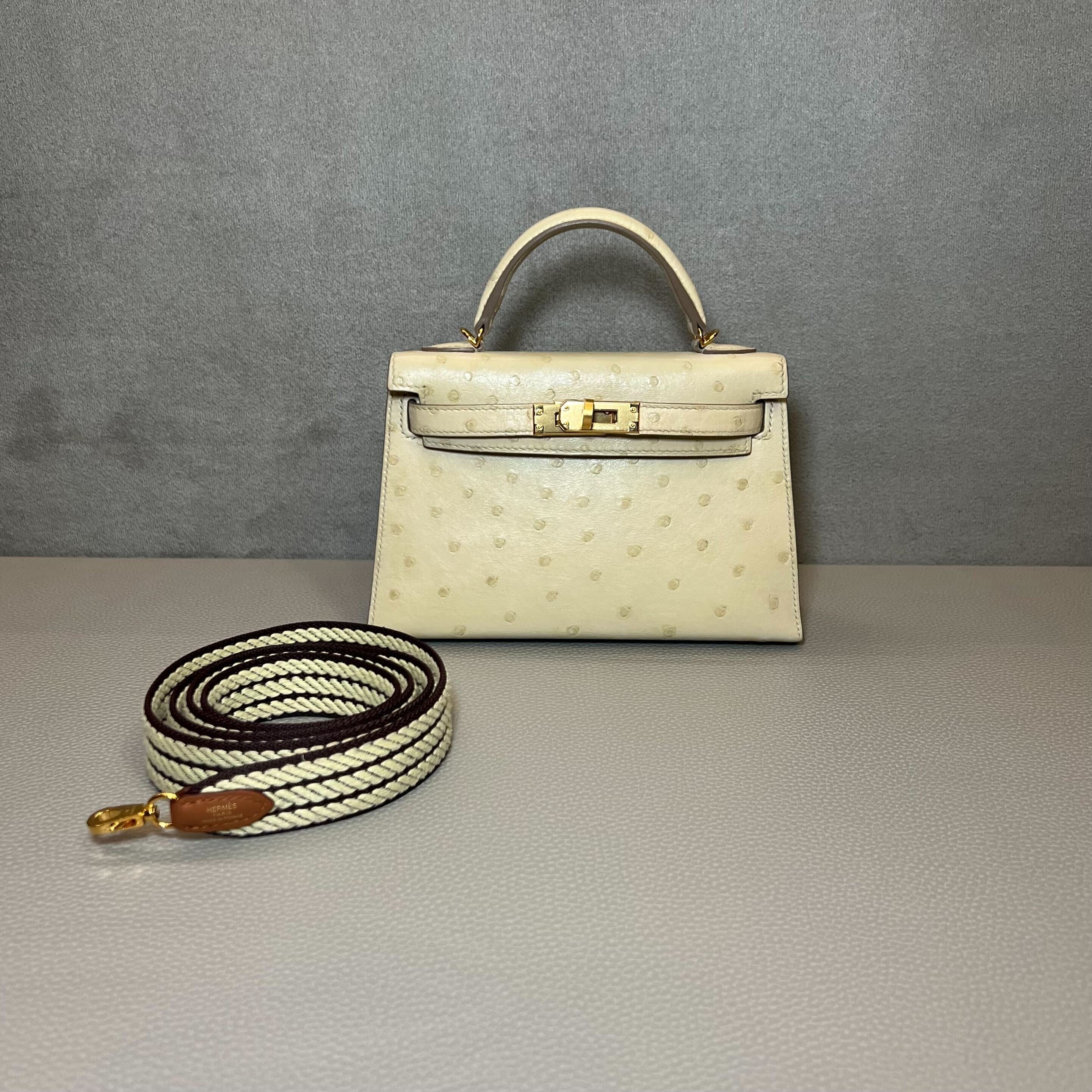 hermes-beton-craie-mini-kelly-sellier-20-ostrich-gold-hardware-hermes-1197118304.jpg