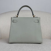 Hermès Bleu Glacier Kelly Retourne 25 Togo Gold Hardware