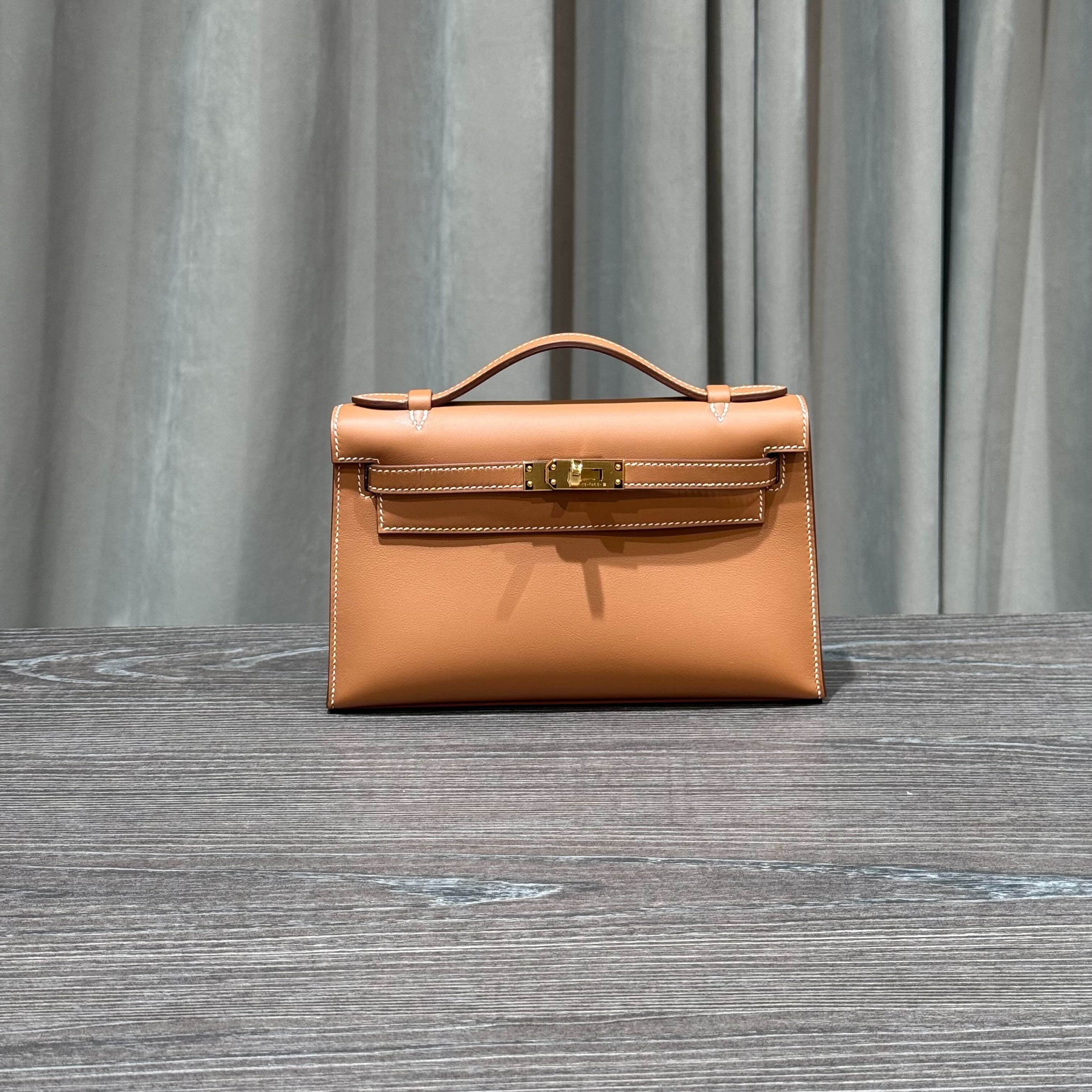 hermes-gold-kelly-pochette-clutch-swift-gold-hardware-hermes-1173888105.jpg