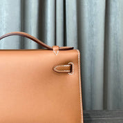Hermès Gold Kelly Pochette Clutch Swift Gold Hardware