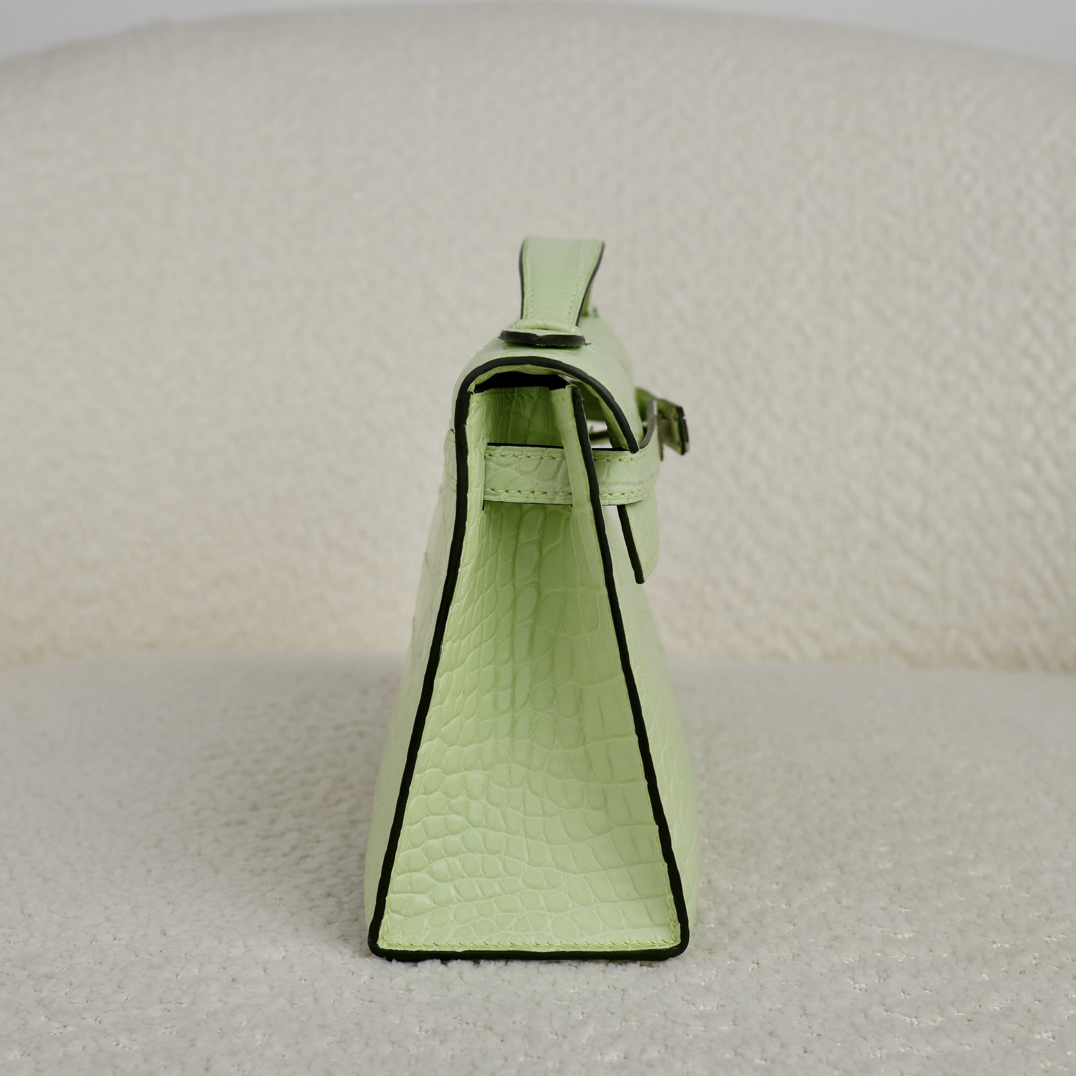 hermes-jaune-bourgeon-kelly-pochette-alligator-palladium-hardware-hermes-1258846627.jpg