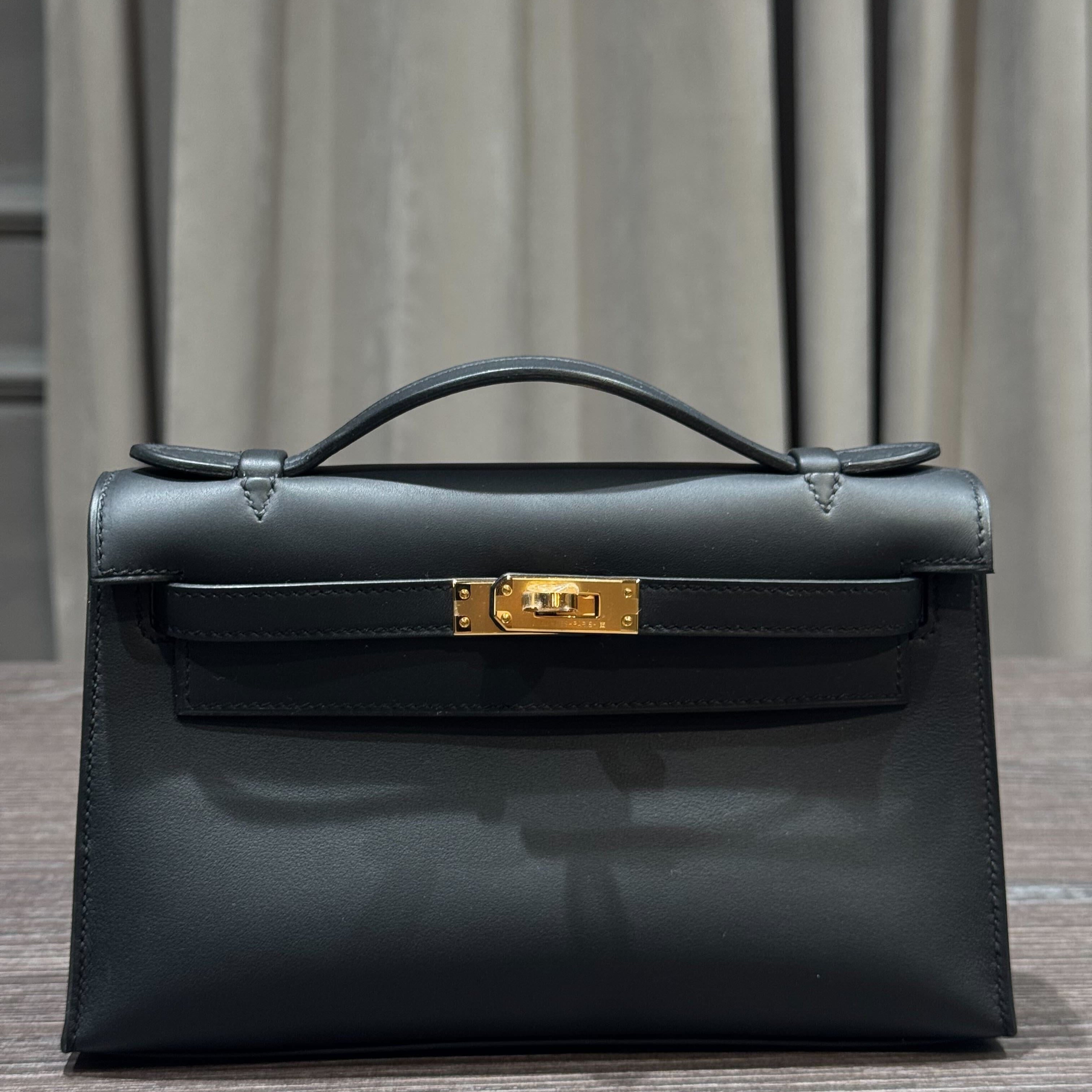 hermes-kelly-mini-pochette-clutch-veau-swift-89-noir-gold-hardware-hermes-1146585312.jpg