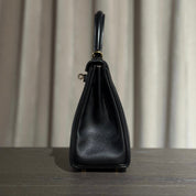 Hermès Noir Kelly Retourne 25 Swift Gold Hardware
