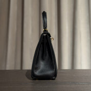 Hermès Noir Kelly Retourne 25 Swift Gold Hardware