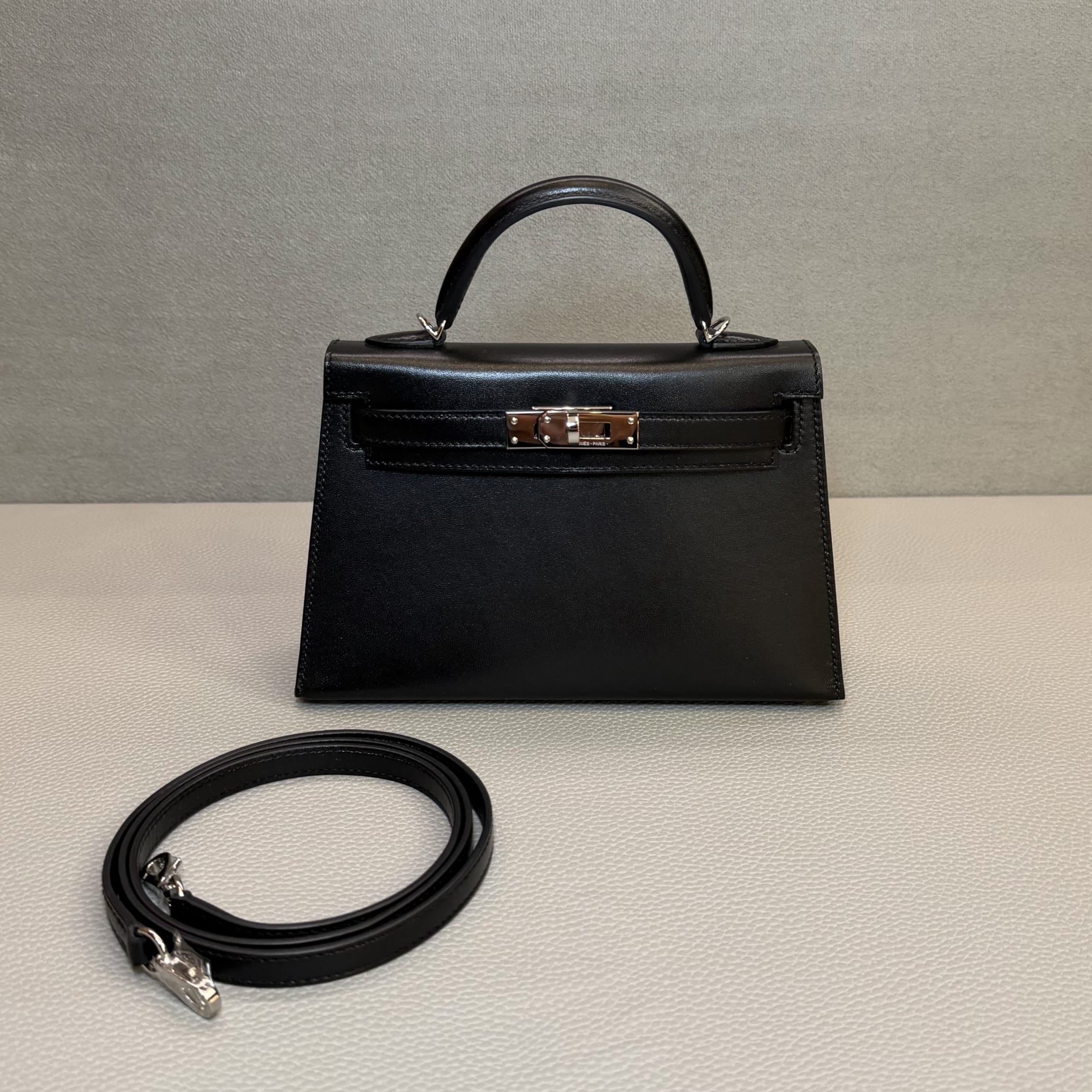 hermes-noir-mini-kelly-sellier-20-box-palladium-hardware-hermes-1240329186.jpg