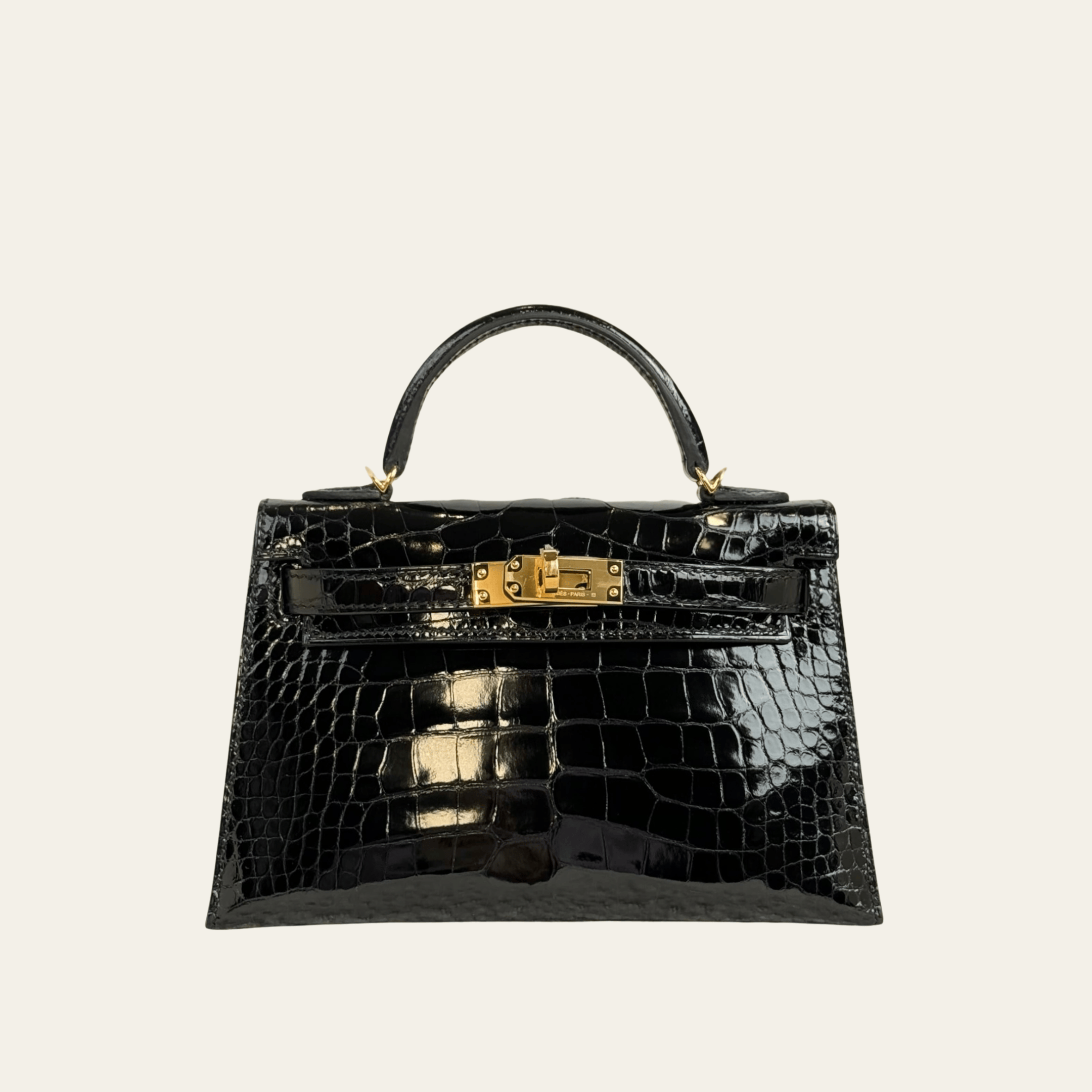 hermes-noir-mini-kelly-sellier-20-mississippi-alligator-gold-hardware-jewels-aficionado-1220794828.png