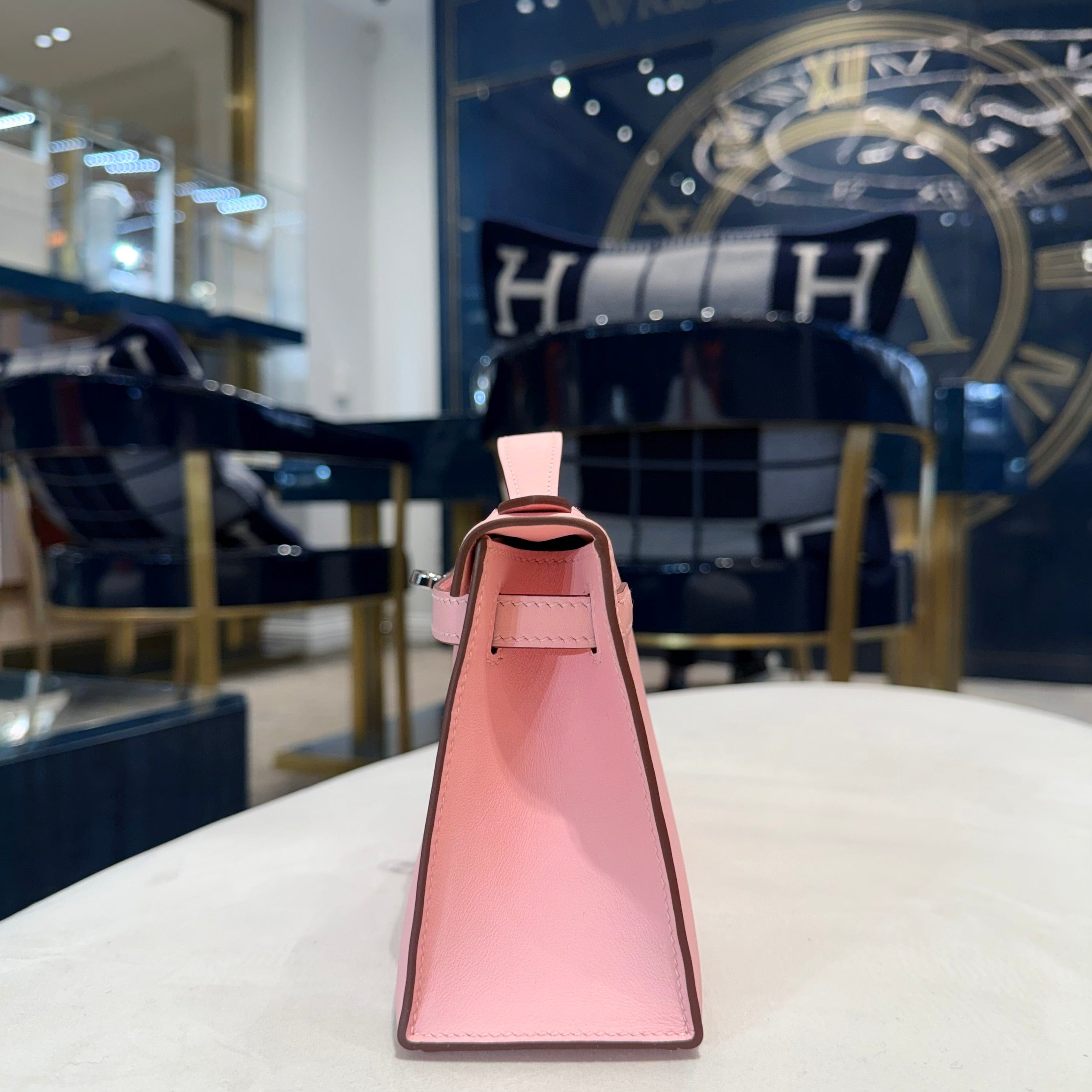 Hermès Rose Sakura Kelly Pochette Swift Palladium Hardware