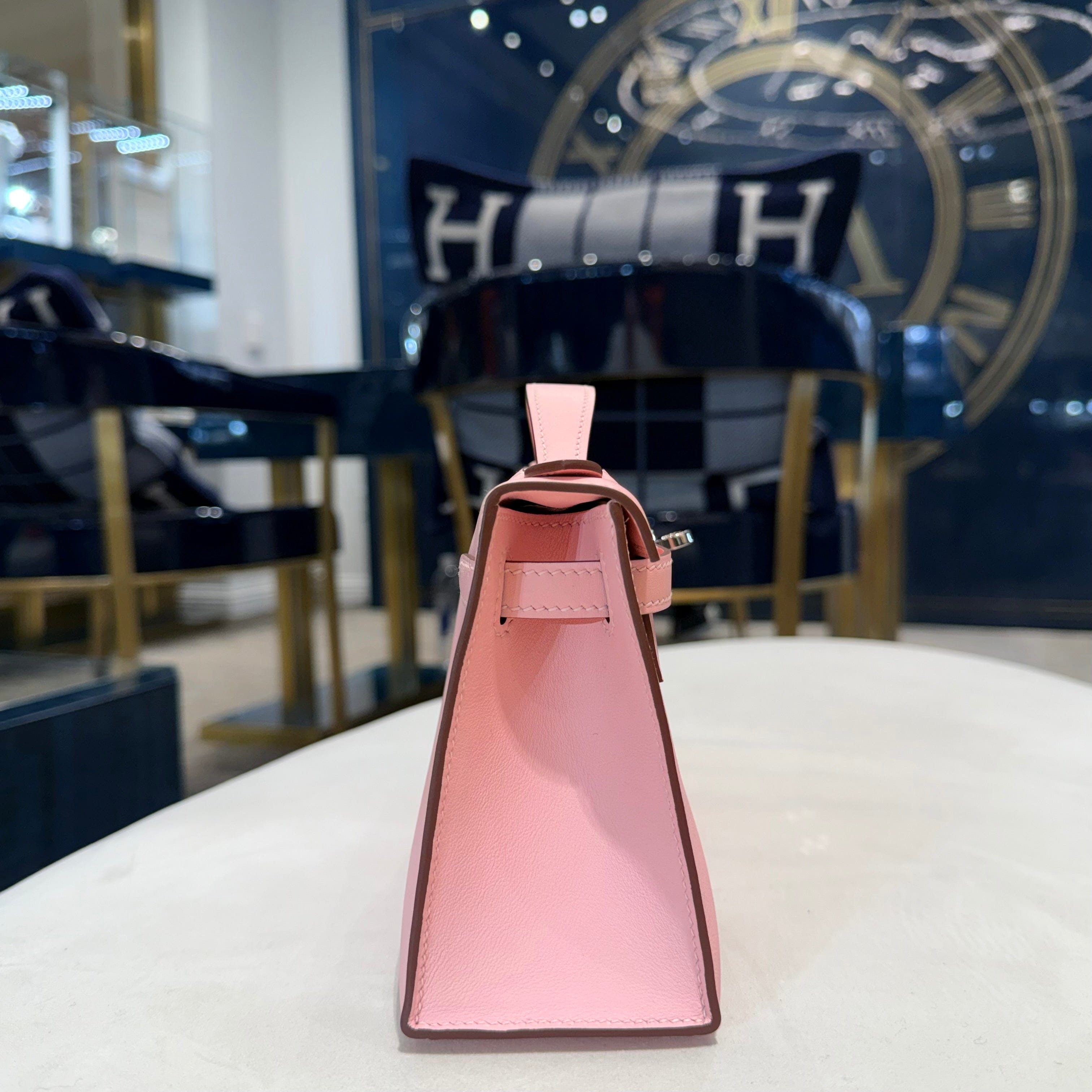 Hermès Rose Sakura Kelly Pochette Swift Palladium Hardware