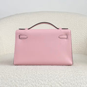 Hermès Rose Sakura Kelly Pochette Swift Palladium Hardware