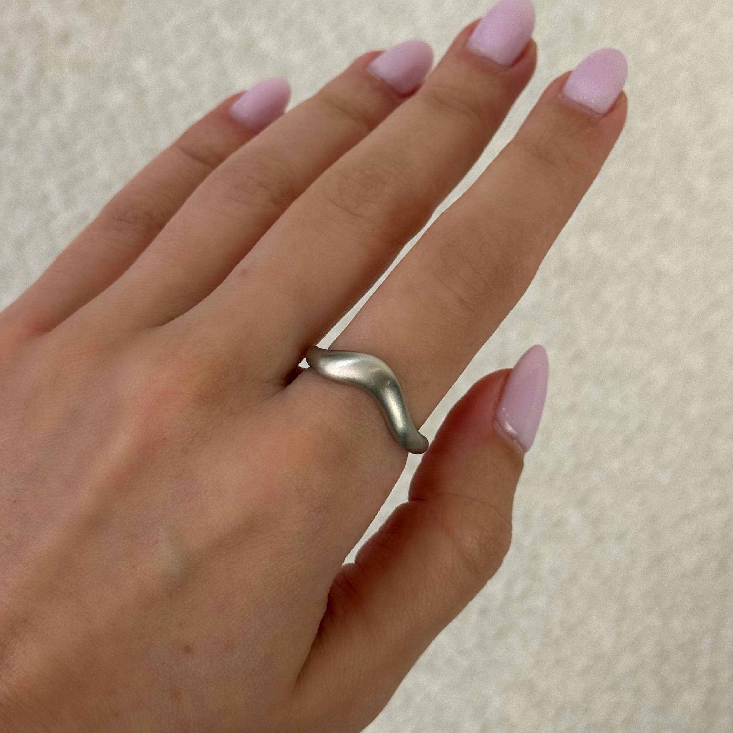 isla-white-gold-wave-ring-jewels-aficionado-1255046853.jpg