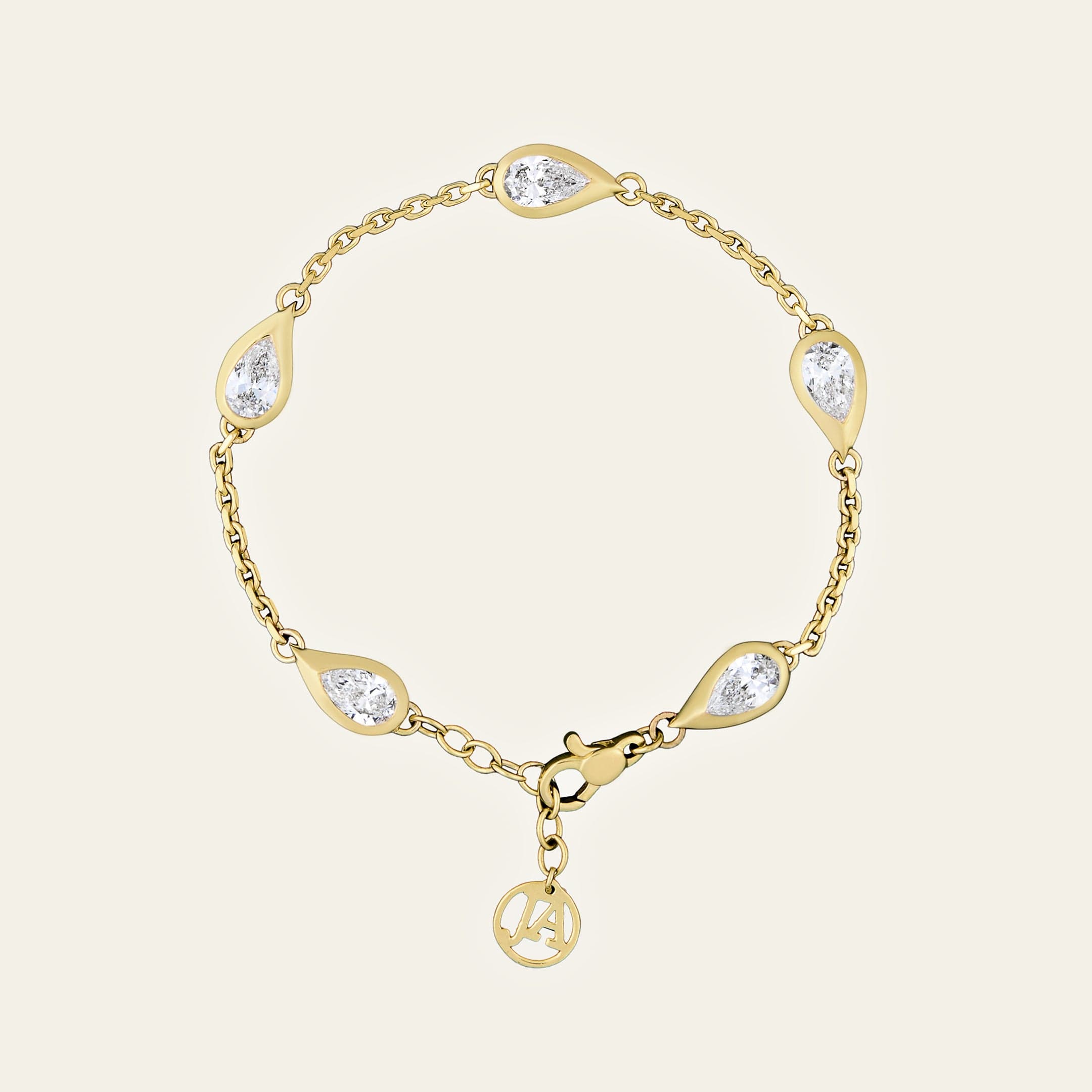 mika-pear-shaped-diamond-bracelet-in-yellow-gold-jewels-aficionado-1183259301.jpg