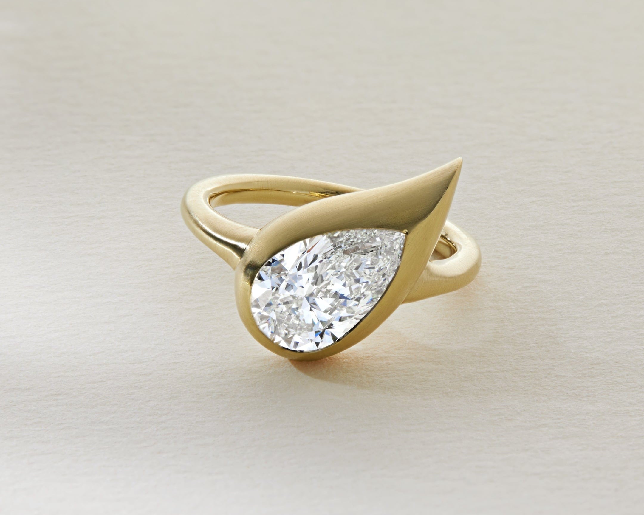 mika-pinky-ring-in-yellow-gold-with-pear-diamond-jewels-aficionado-1146591208.jpg