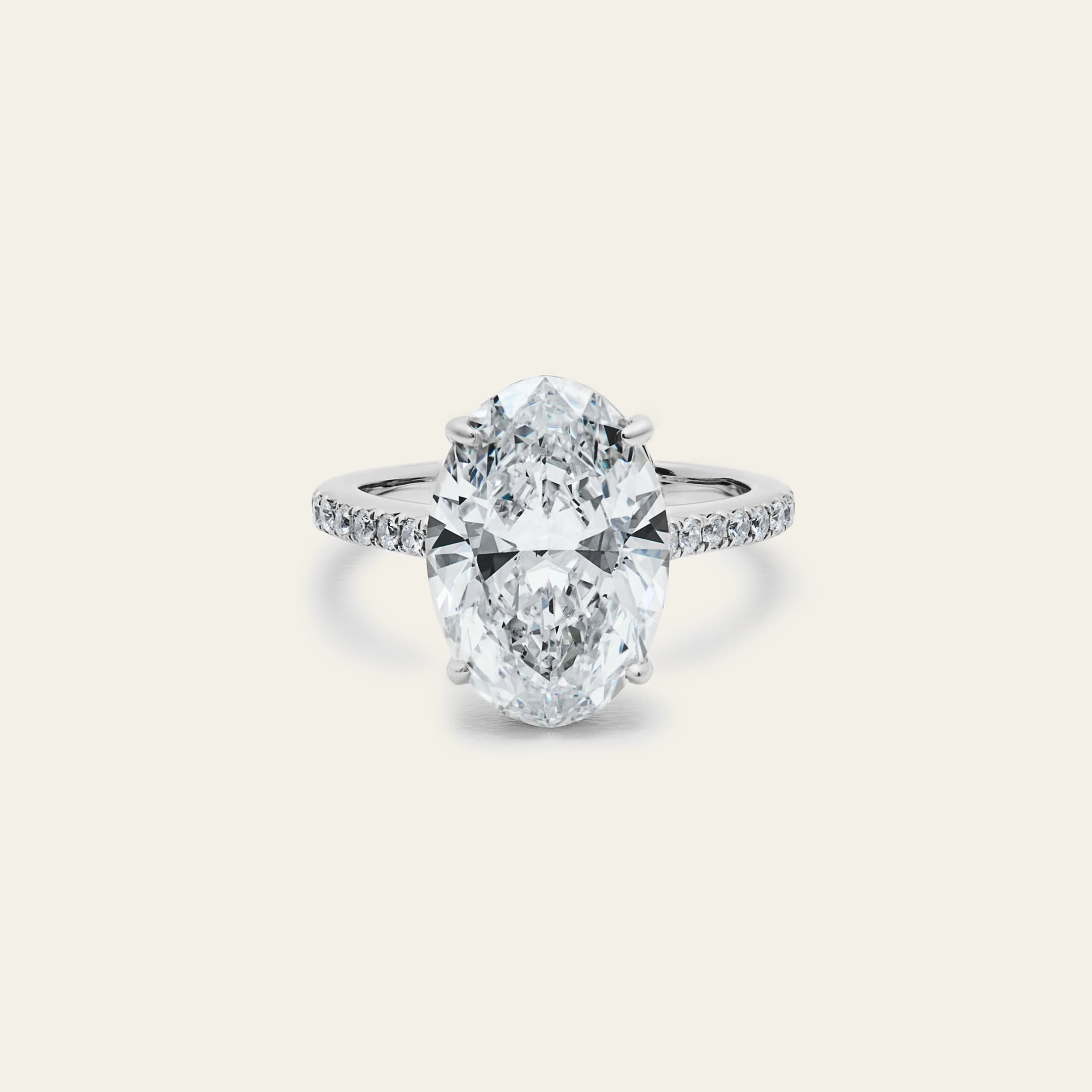 oval-diamond-engagement-ring-jewels-aficionado-1230348057.jpg