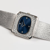 Patek Philippe Golden Ellipse 4126/1 White Gold Blue Diamond Dial Diamond Bezel
