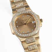 Patek Philippe Nautilus 4700 Yellow Gold Champagne Diamond Dial Diamond Bezel