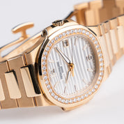 Patek Philippe Nautilus 7010/1R-011 'Ladies' Rose Gold Silver Dial Diamond Bezel Quartz