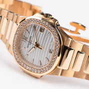 Patek Philippe Nautilus 7010/1R-011 'Ladies' Rose Gold Silver Dial Diamond Bezel Quartz