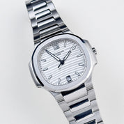 Patek Philippe Nautilus 7118/1A-010 Stainless Steel Silvery Opaline Dial