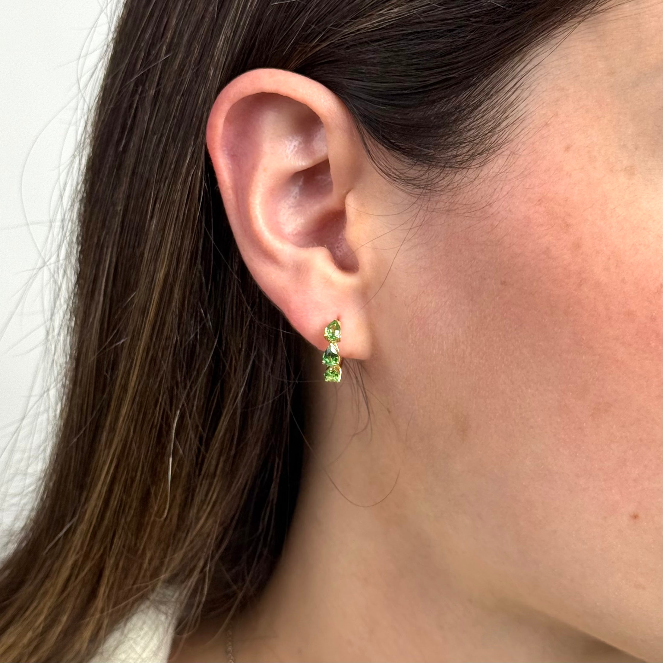 pear-shaped-tsavorite-huggie-earrings-jewels-aficionado-1210263994.heic