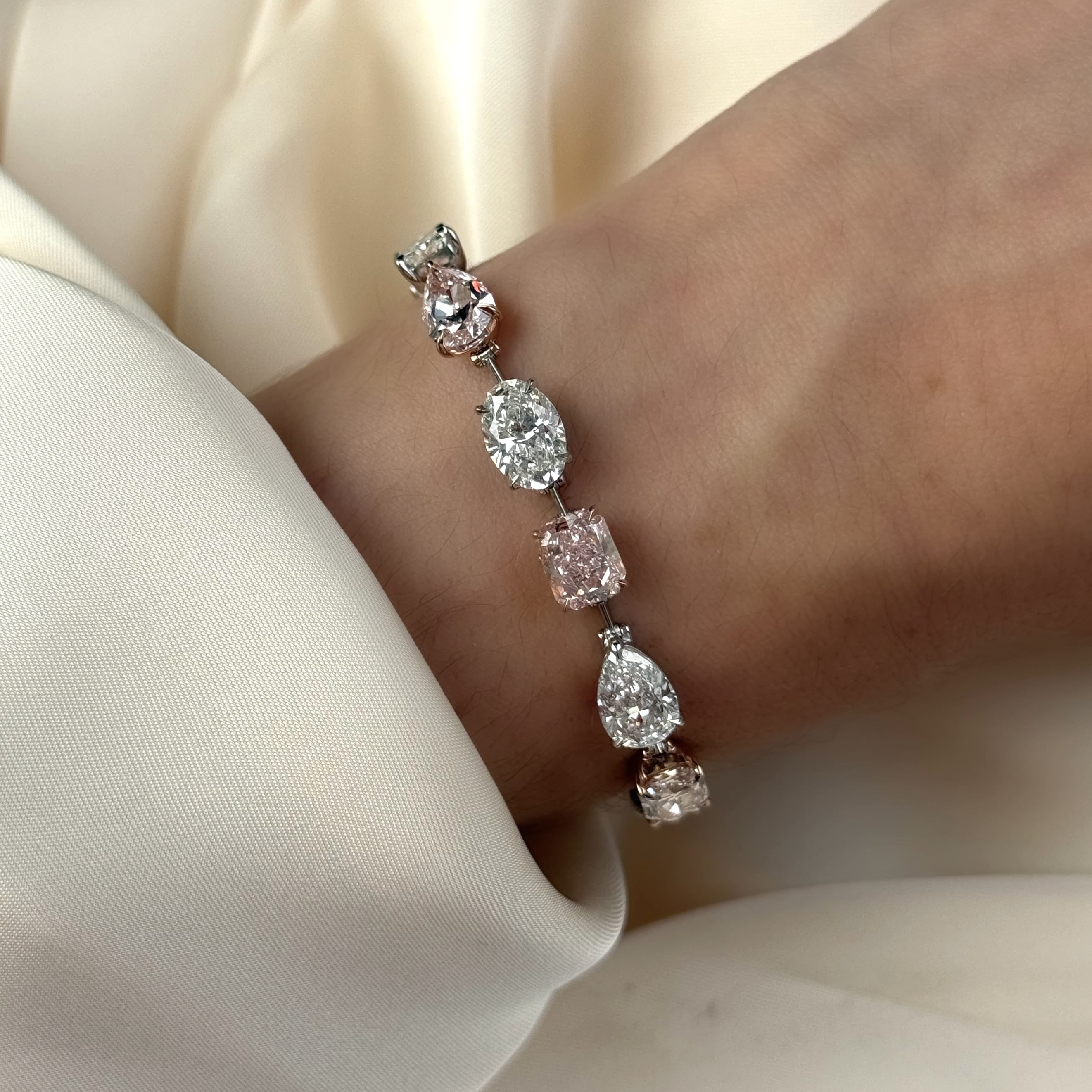 pink-and-white-diamond-bracelet-jewels-aficionado-1254232234.jpg