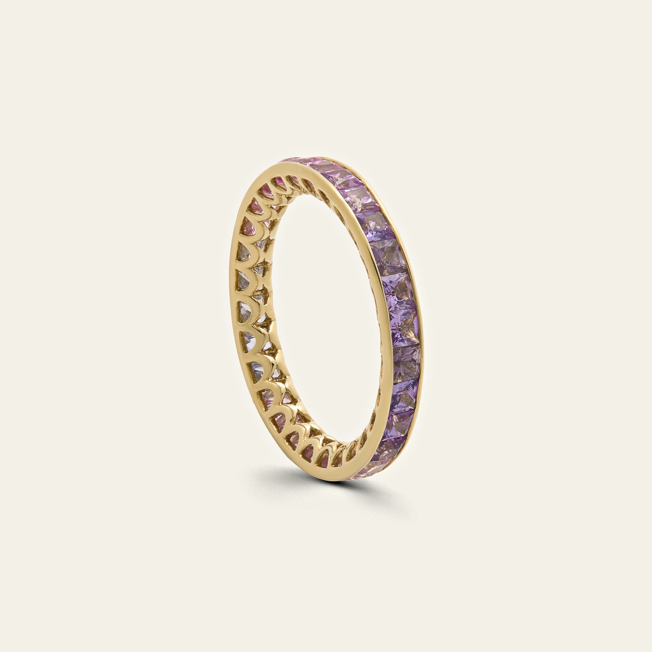 purple-sapphire-eternity-band-jewels-aficionado-1227521173.jpg