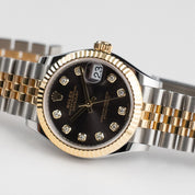 Rolex Datejust 31 278273 'Ladies' Stainless Steel Yellow Gold Dark Grey Diamond Dial Jubilee (2026)