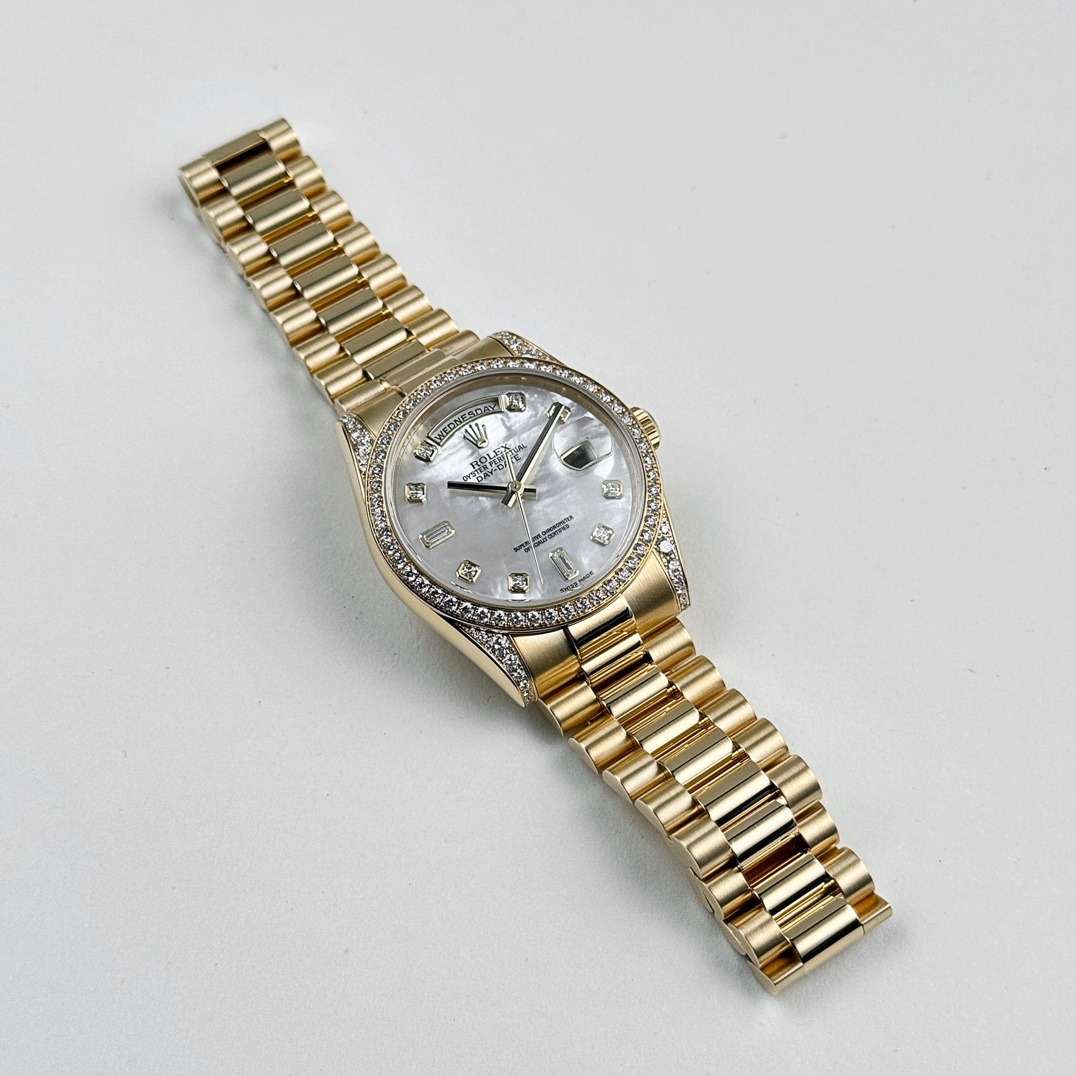 Rolex Day-Date 118388 Yellow Gold White Mother of Pearl Dial Diamond Bezel (2008)