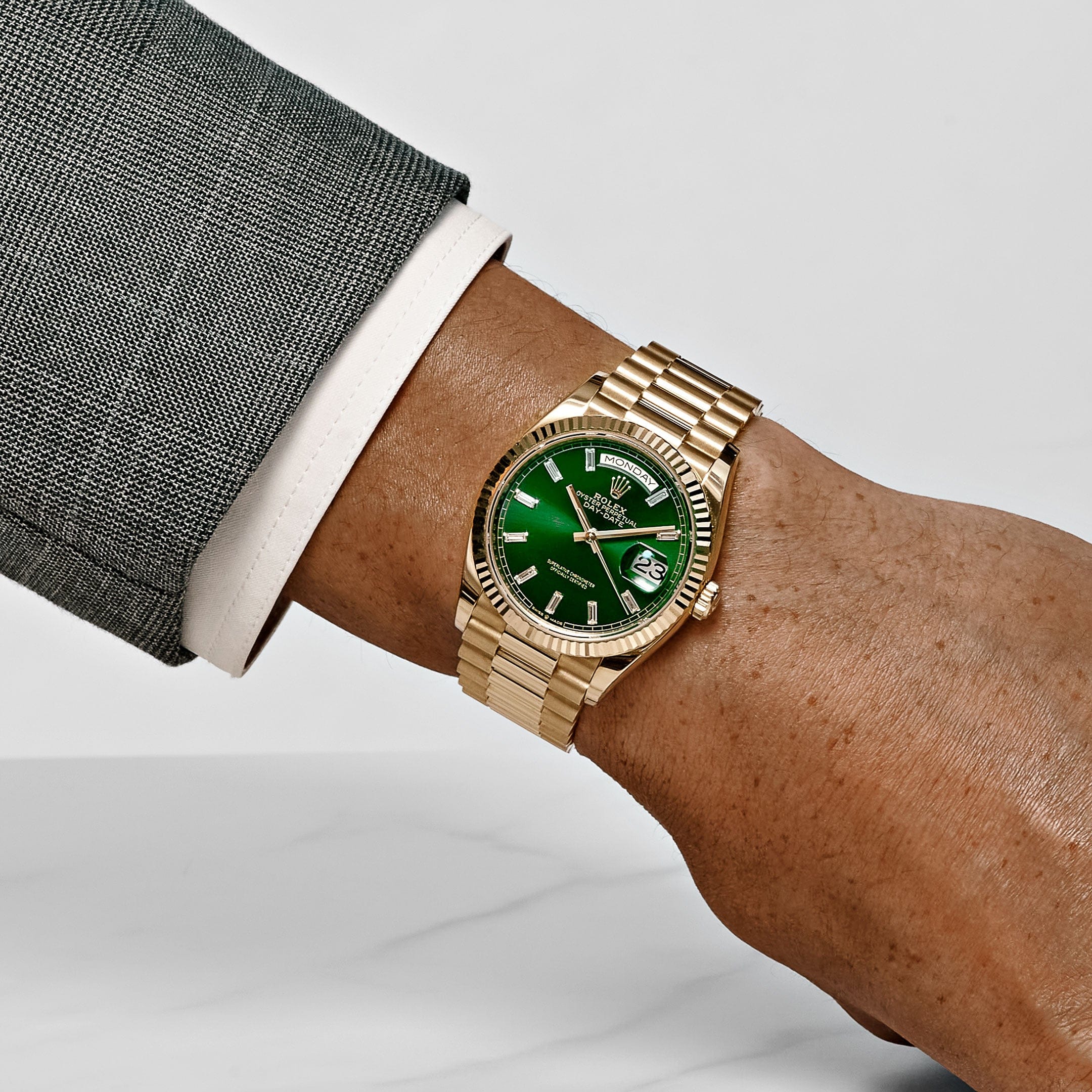 rolex-day-date-36-128238-yellow-gold-green-diamond-baguette-dial-2025-rolex-1255790868.jpg