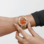 Rolex Day-Date 36 128398TBR Yellow Gold Carnelian Diamond Roman Numerals Dial Diamond Bezel