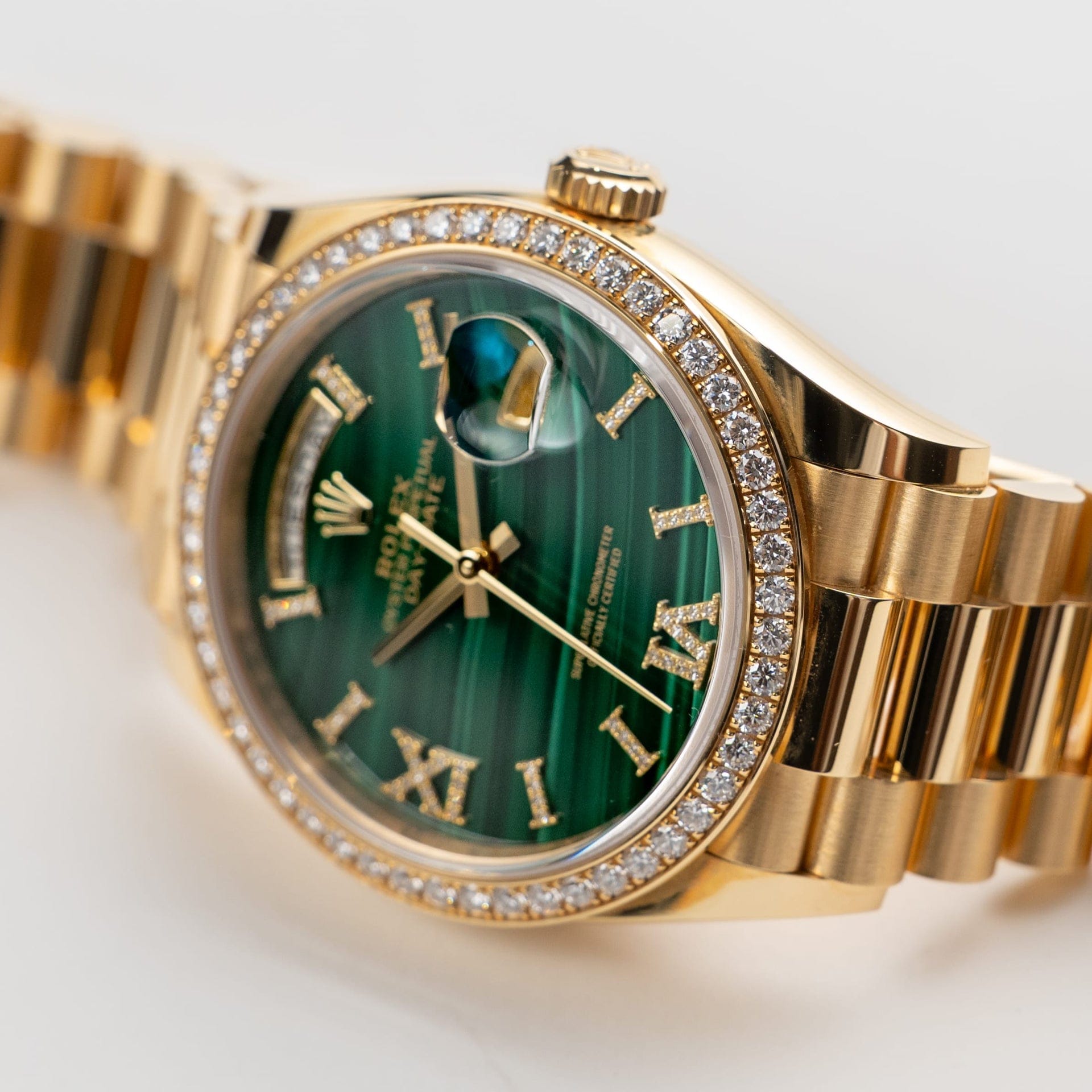 Rolex Day-Date 36 128348RBR Yellow Gold Green Malachite Dial Diamond Bezel (2021)