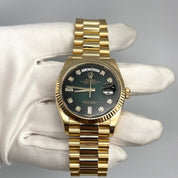 Luxury Watch Rolex Day-Date 36 Yellow Gold Green Diamond Dial 128238 Wrist Aficionado