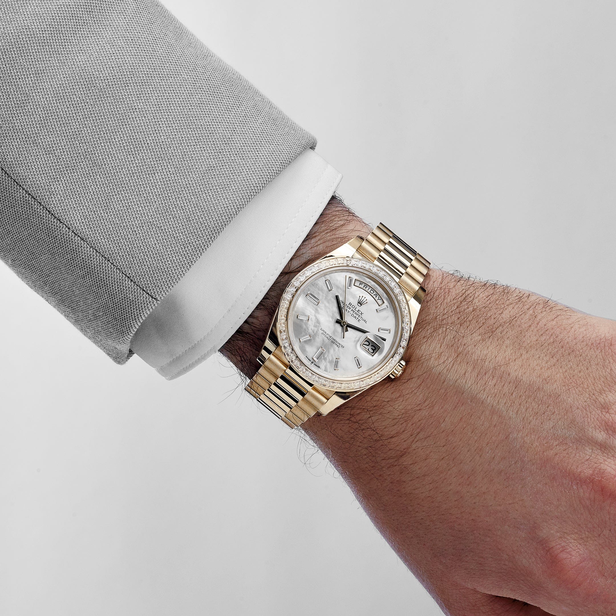 Rolex Day-Date 40 228398TBR Yellow Gold Mother of Pearl Diamond Baguette Dial and Bezel (2025)