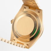 Rolex Day-Date 40 228398TBR Yellow Gold Mother of Pearl Diamond Baguette Dial and Bezel (2025)