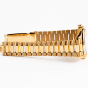 Rolex Day-Date 40 228398TBR Yellow Gold Mother of Pearl Diamond Baguette Dial and Bezel (2025)