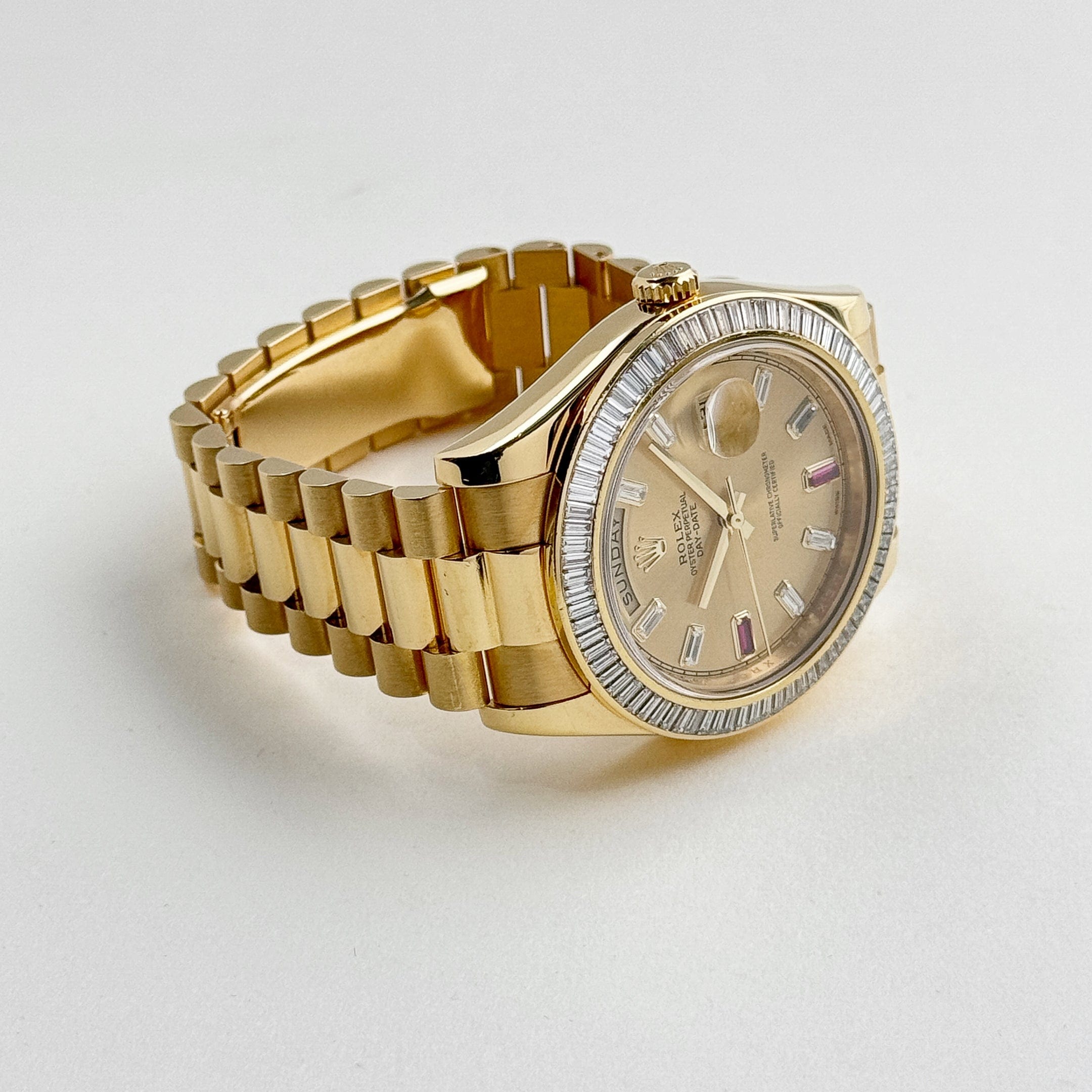 Rolex Day-Date II 218398 Yellow Gold Champagne Ruby Dial Diamond Bezel (2010)